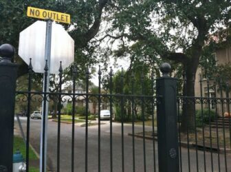 The fence has blocked through-traffic on Newcomb Boulevard for more than six years.