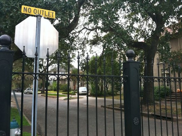 The fence has blocked through-traffic on Newcomb Boulevard  for more than six years. 