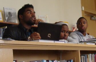 Erick Dillard, a student at John McDonogh, spoke during Tuesday's meeting of the executive board.
