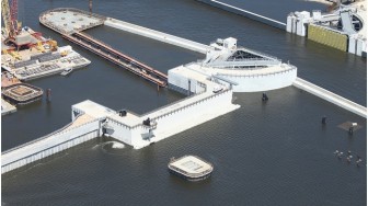 The barge gate is show in the closed position with the sector gate left open.