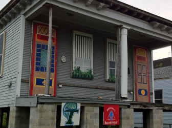 Boarded up doors and windows are re-imagined, right down to the window boxes.