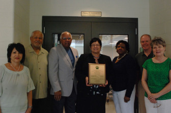 The Advocacy for the Arts and Technology board of directors, left to right, Simonne Robinson, Stephen Boyard, Vice President John Jones, Board Chair Grisela Jackson, Principal Charmaine Robertson, Secretary Sean Rafferty, Mary Ellen Alexander.