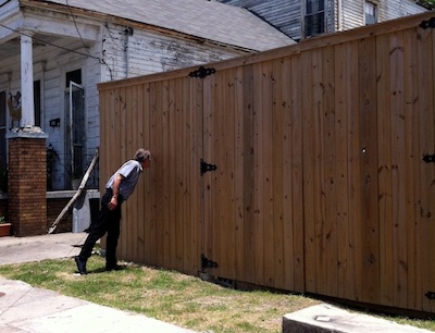 This fence in the Bywater neighborhood is also on Friday's agenda.