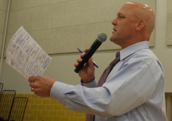 His notes in hand, Mayor Mitch Landrieu answers questions during the first public meeting on the budget on Aug. 13.