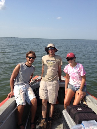 Tulane's Alex Kolker, center, with research associates Dan Coleman and Annie Schneider, search for the "missing river." Kolker became interested in the subject while swimming in a part of Barataria Bay that he expected would be more saline.