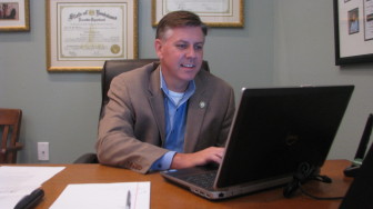 State Rep. Chris Broadwater, R-Hammond, checks government websites for compliance with his law requiring that a custodian of records be listed. 