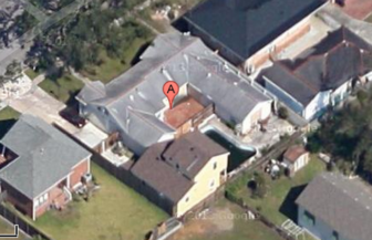 The city has ordered the owner of this Gentilly property to reduce the size of a building erected in the backyard.