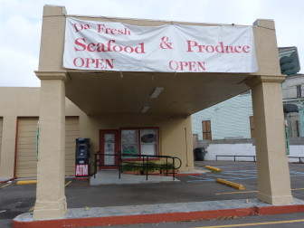 The big sign out front says DaFresh Seafood & Produce is open, but signs on the windows and doors say it's closed. Owner Doug Kariker said he's selling the store because it was too much work. The store received a low-interest loan meant to expand fresh food offerings in under-served neighborhoods.