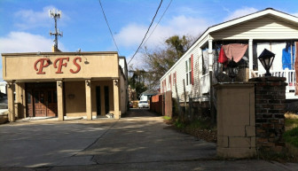 Two of seven properties that would be razed to make room for a CVS pharmacy.