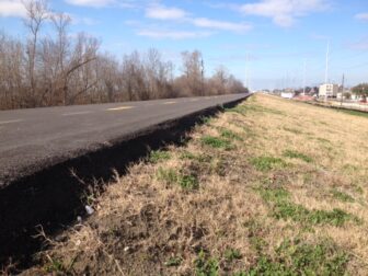 The U.S. Army Corps of Engineers has delayed the opening of the bike path along the Mississippi River until the contractor can address a sharp drop on the side of the path.