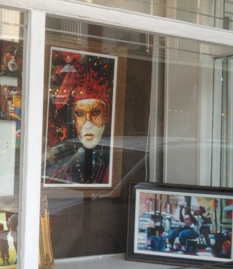 A higher echelon of French Quarter souvenir shops traffics in posters, Carnival masks and other icons dear to tourists. They've escaped the wrath that the residents' association visits on T-shirt vendors.