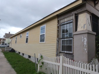 New siding was installed on the house at 3100 Cleveland Ave. after The Lens checked on it last winter.