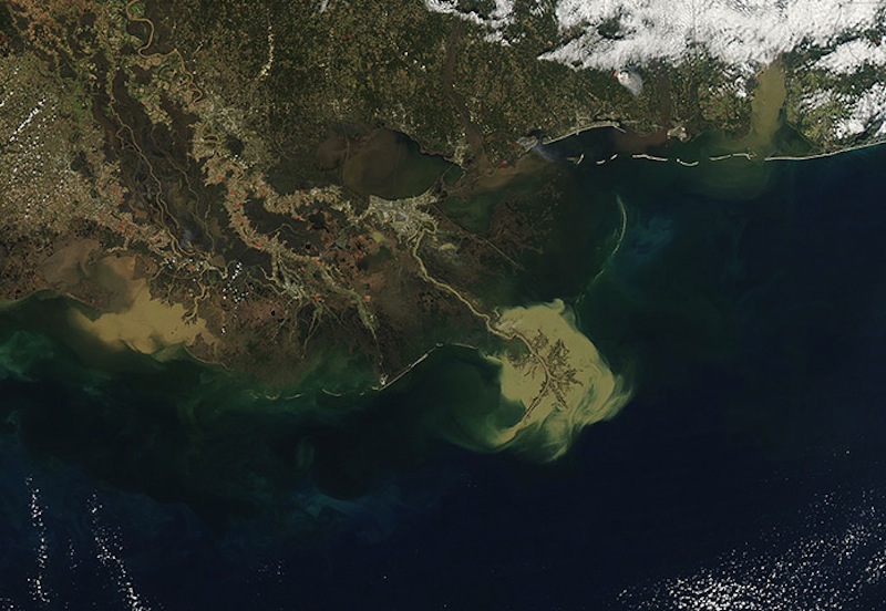 Early results from an ongoing state-federal research project indicate the Mississippi River carries enough sediment to meet the  wetlands-building projections made in the 2012 Master Plan for the Coast.  The diversions are designed to divert the sediment seen exiting the mouth of the river in this NASA satellite photo into the sinking basins south of New Orleans
