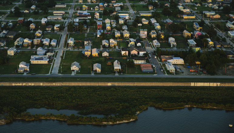 A new, stronger levee and flood wall protects the Lower 9th Ward from the Industrial Canal. This was the section that failed after Hurricane Katrina, letting a barge float through and flooding the working-class neighborhood and washing away home.