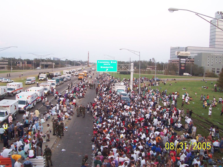 Throngs gather at Causeway Boulevard and I-10 for belated evacuation from the Katrina disaster zone.