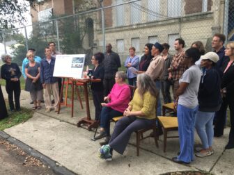 Neighbors of the old McDonogh No. 31 school gather at the site Thursday to raise objections to the density of a proposed redevelopment of the building.