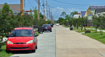 The parking lane on Deslonde Street was paved with a solid but porous concrete mixture. The city said results indicate the practice should be used throughout the city where affordable. 