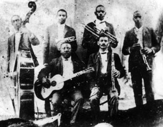 Bolden, top row 2nd from left, fused church music with ragtime to invent something altogether new: jazz. 