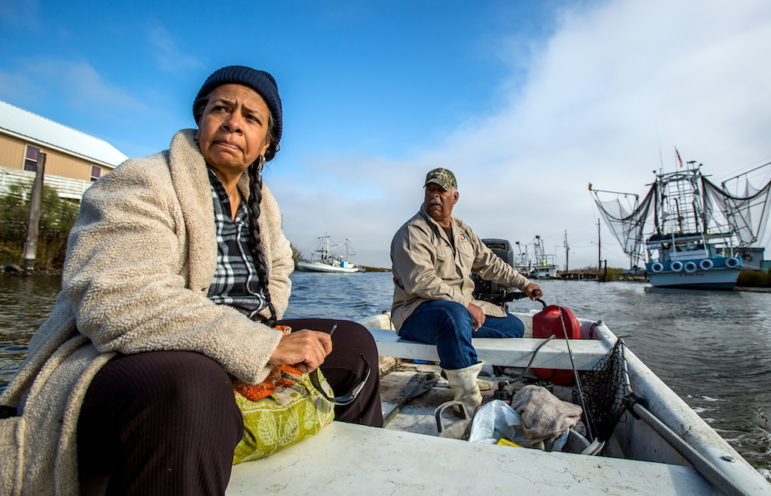 Rosina Phillipe, left, and her brother, Maurice Phillips, boat along Grand Bayou south of New Orleans recently. ‘For us, home is more than the building you live in – it’s everything in the environment that surrounds you,’ said Phillipe, an elder of the Atakapa-Ishak/Chawaska tribe. ‘If you leave you become someone else.'