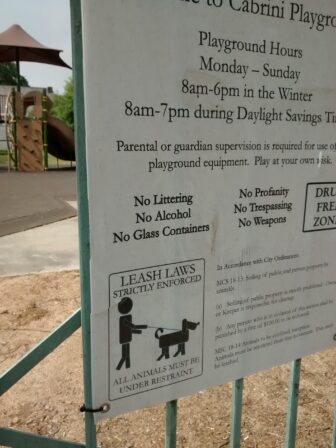 The rule that dogs in Cabrini Playground must remain leashed is regularly ignored. Dog owners want a fenced area where their pets can run free. 