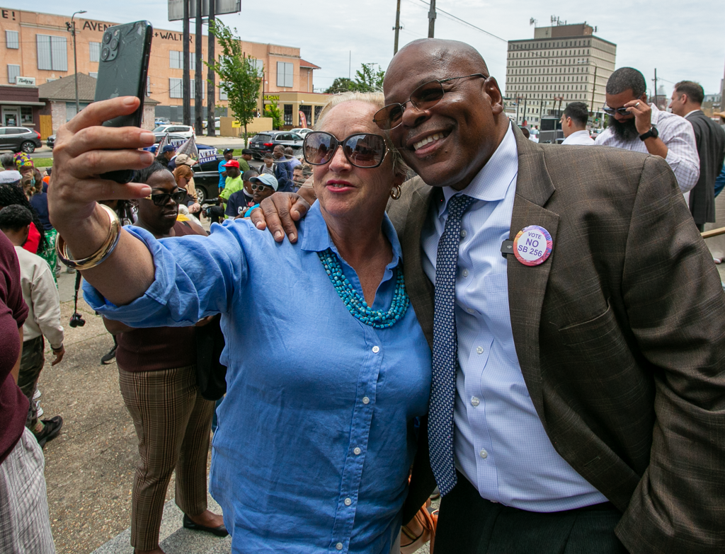 As Duncan waits for courts to act, New Orleanians pose for selfies with him.